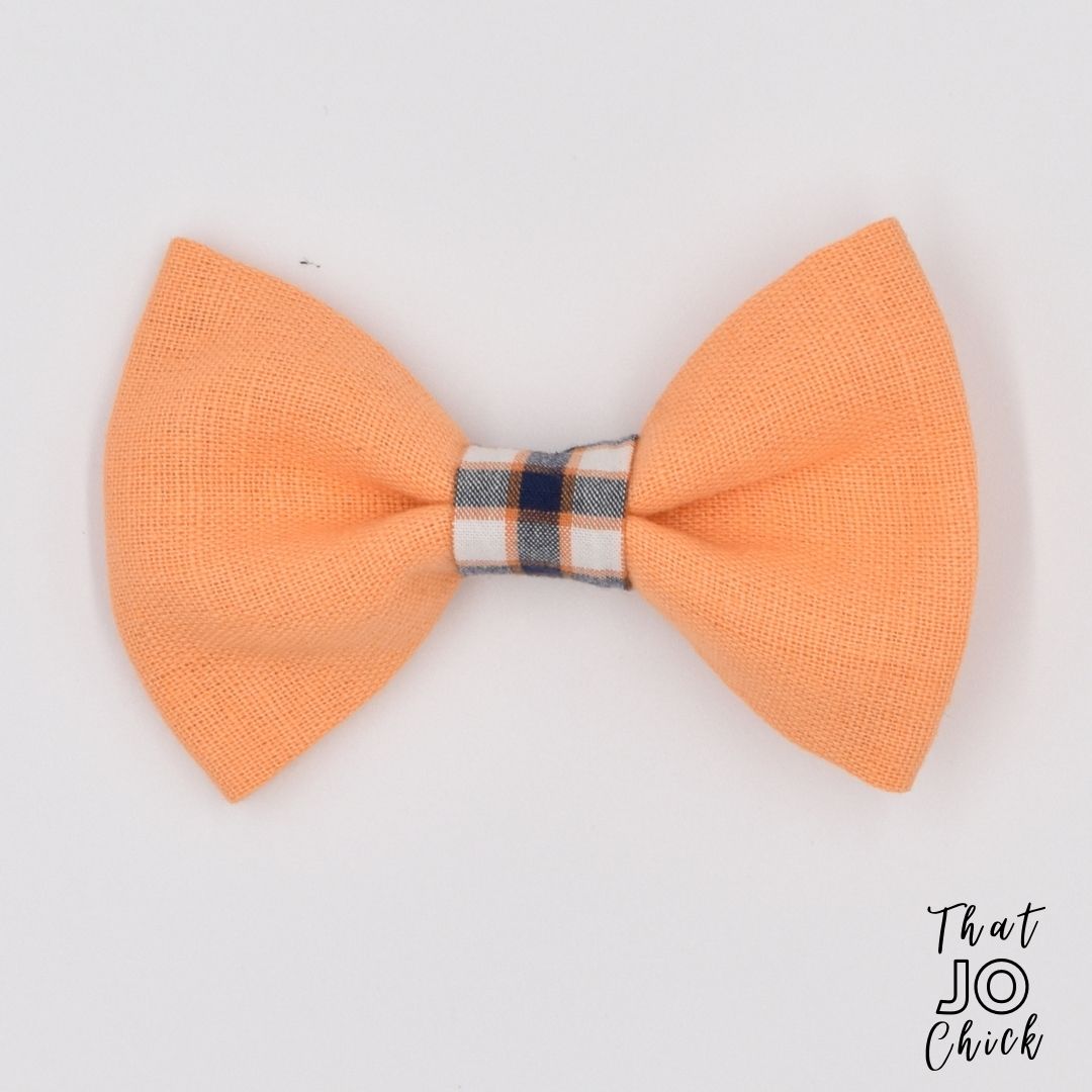 Handmade girls orange and plaid linen hair bow