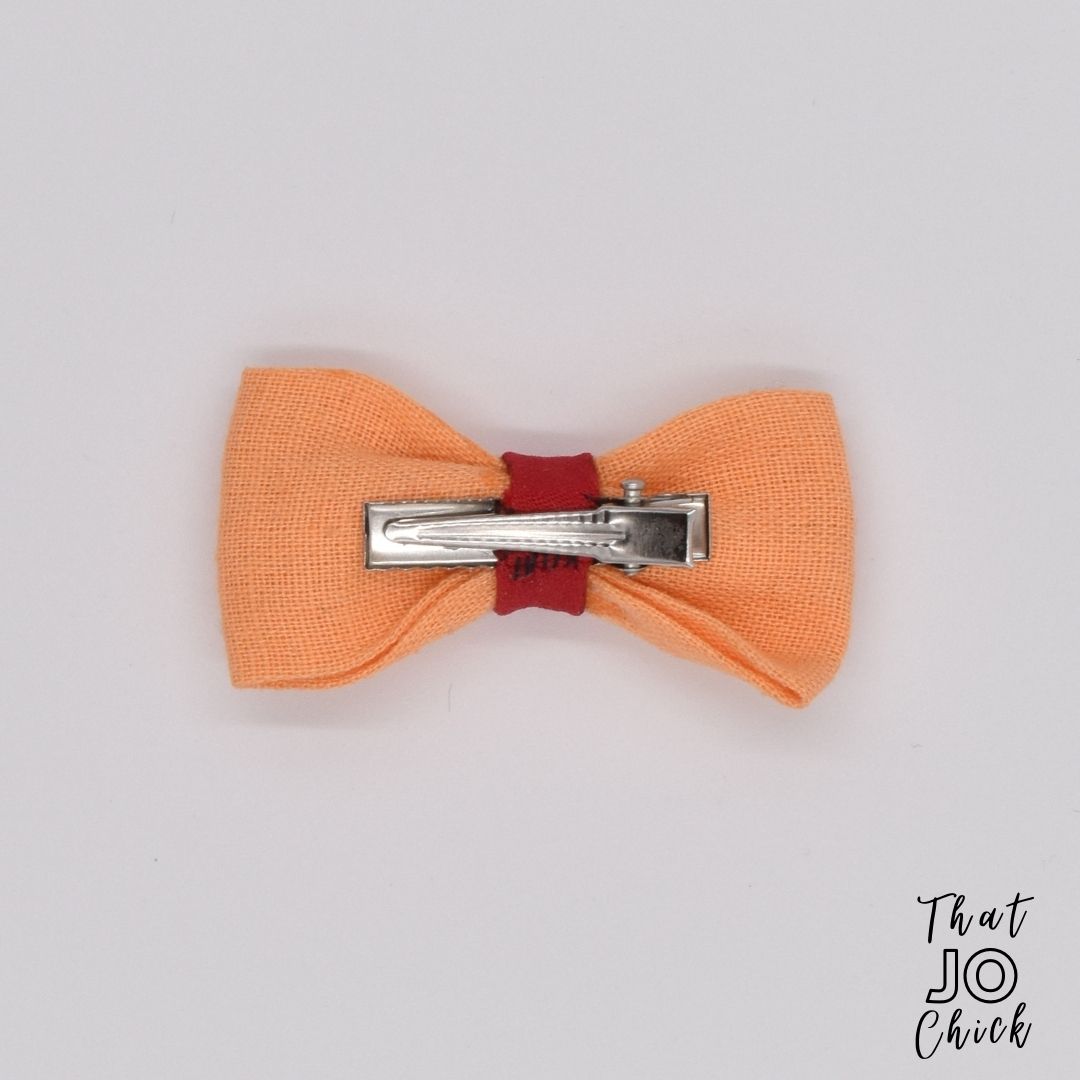 Handmade girls orange and red linen hair bow