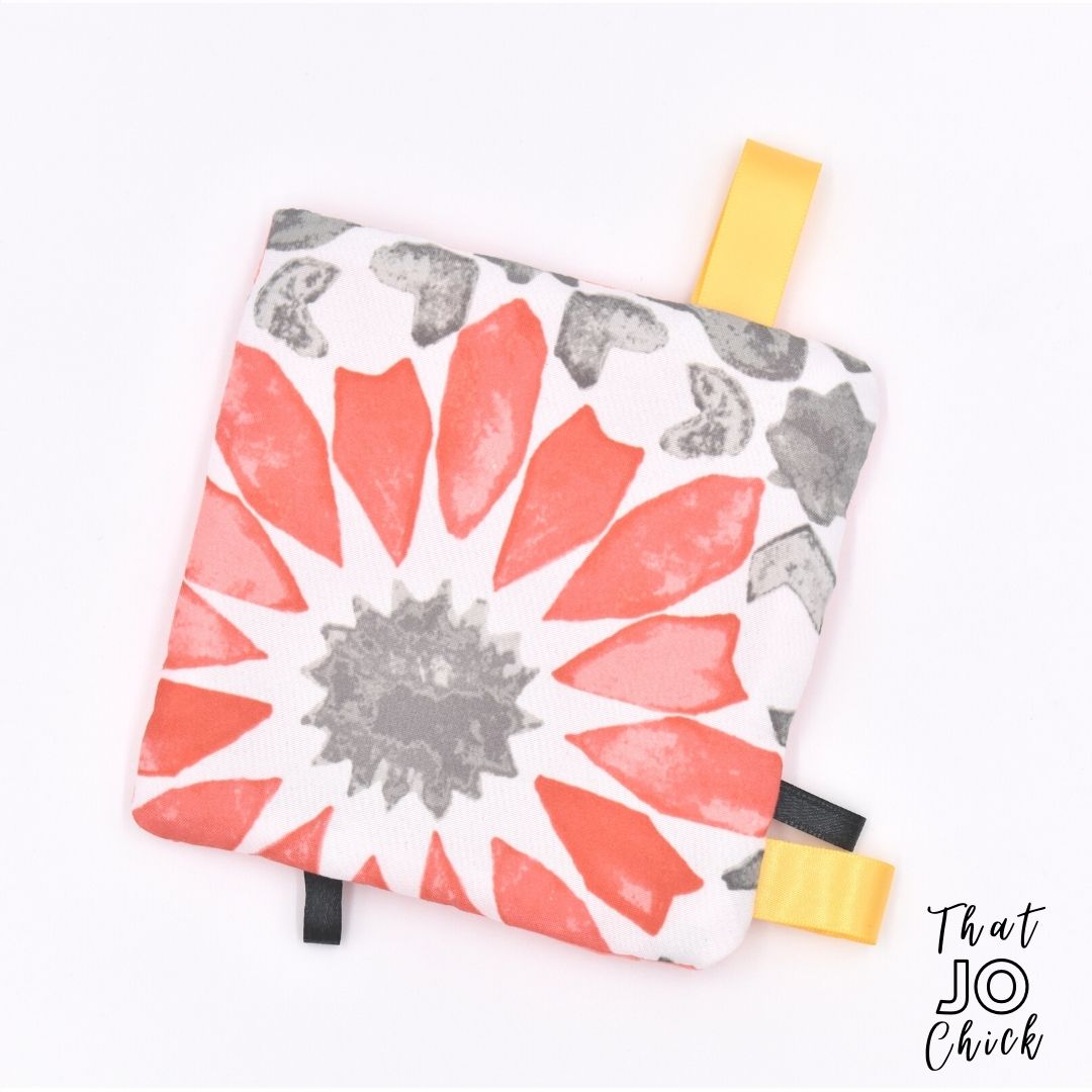 This soft handmade toy has layers of crinkly material for that sound that babies obsess over!