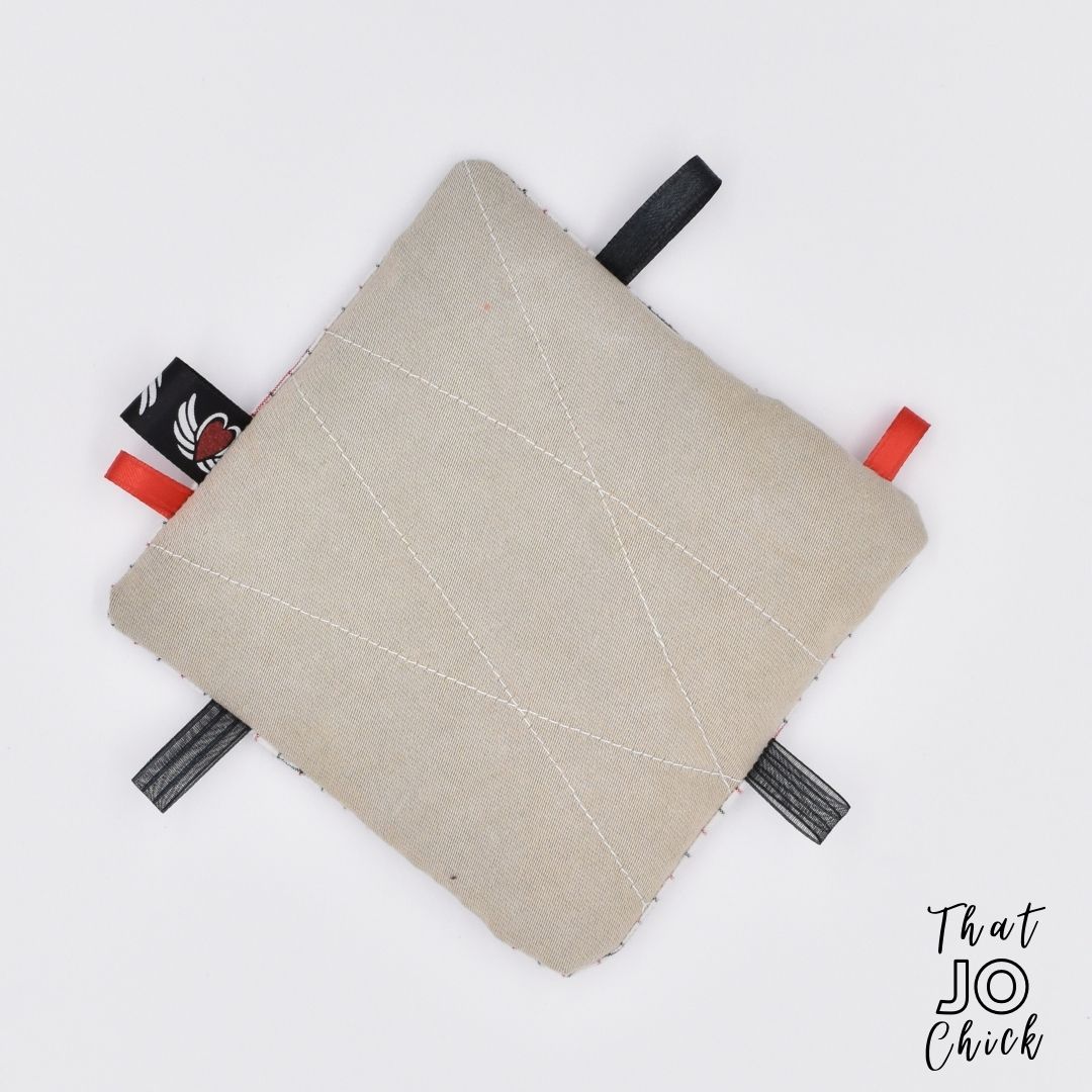 This soft handmade toy has layers of crinkly material for that sound that babies obsess over!