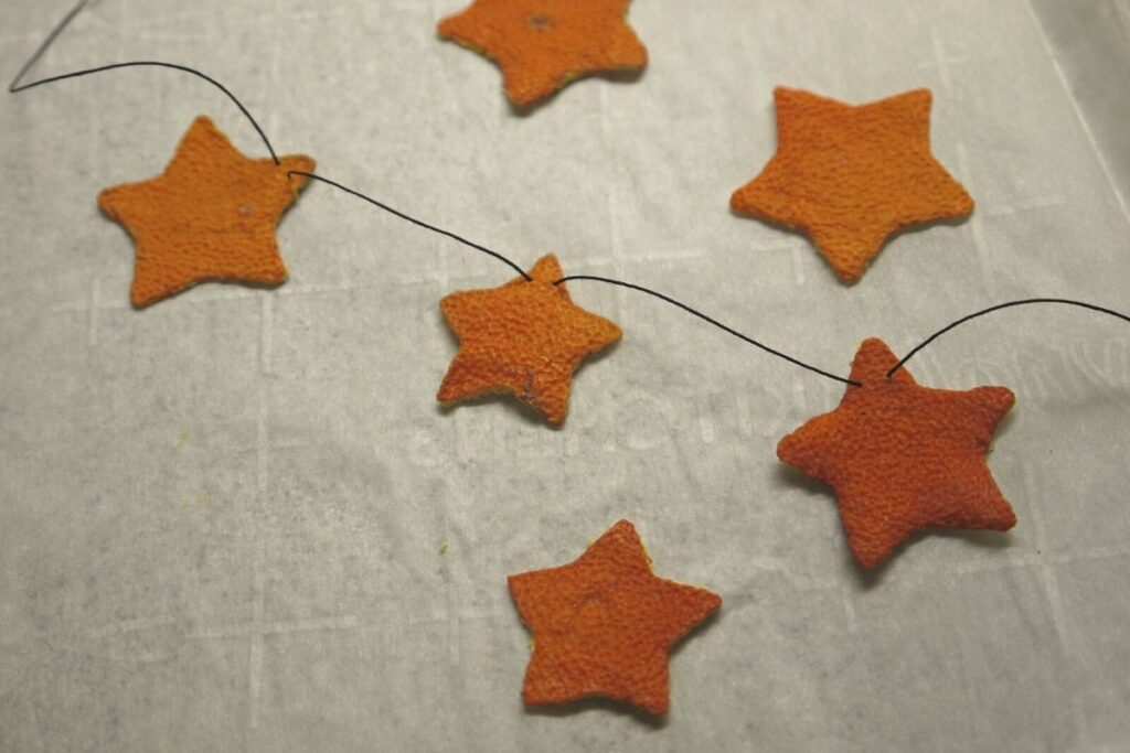 orange peel stars being strung together 